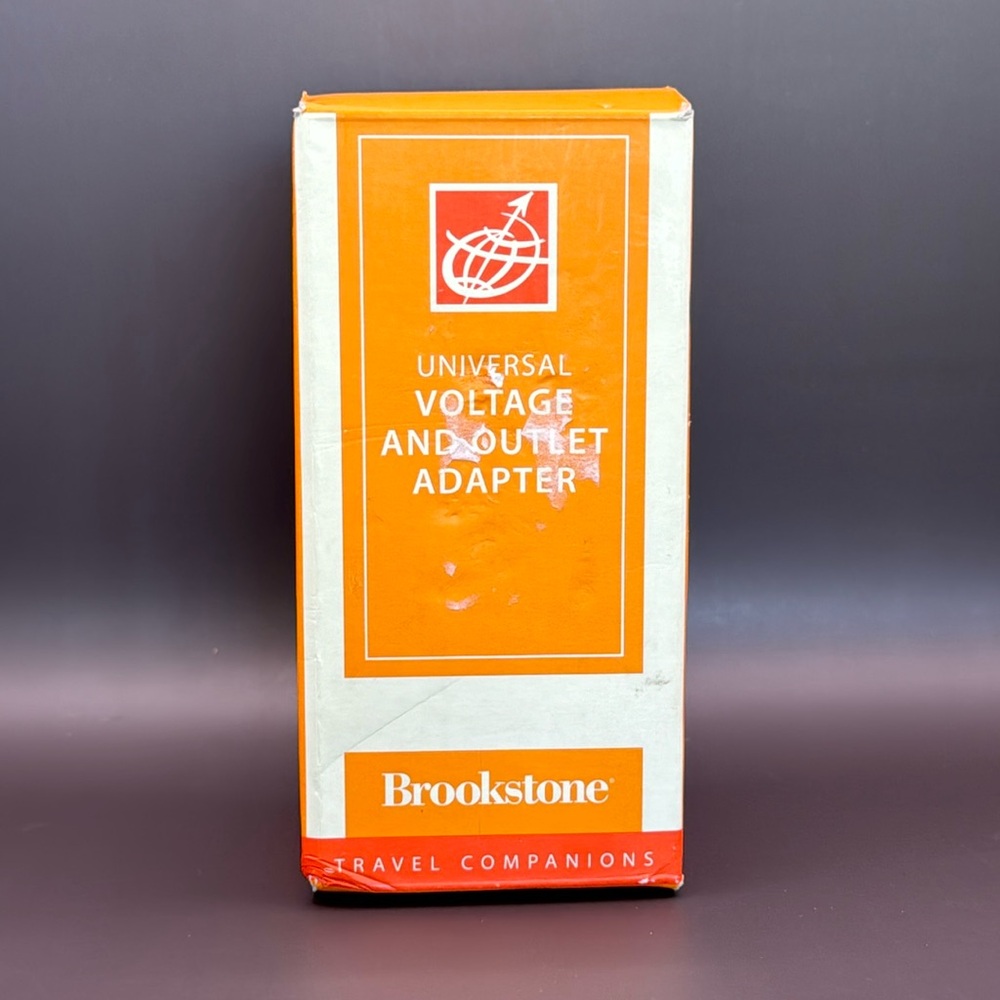 NIB BROOKSTONE™️ Universal Voltage and Outlet Adapter